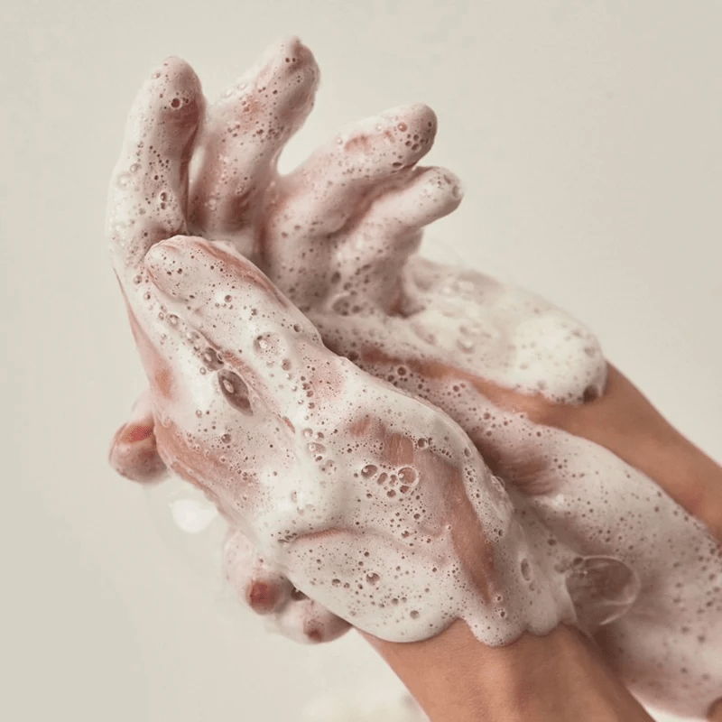 Cleansing foam lather on hands