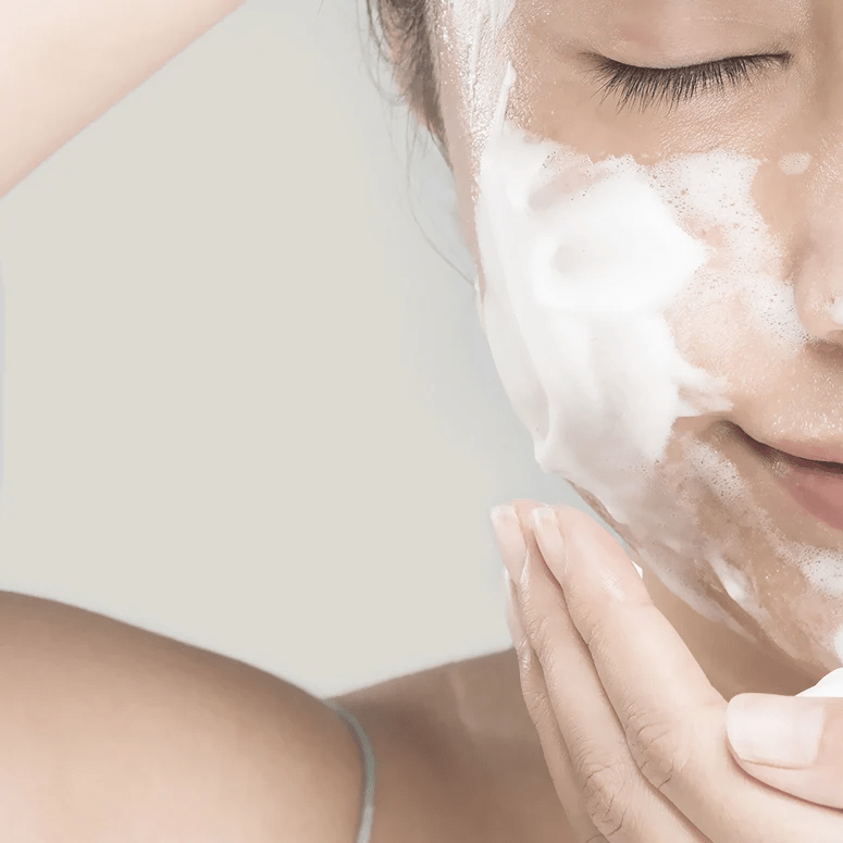 Cleansing foam applied to face
