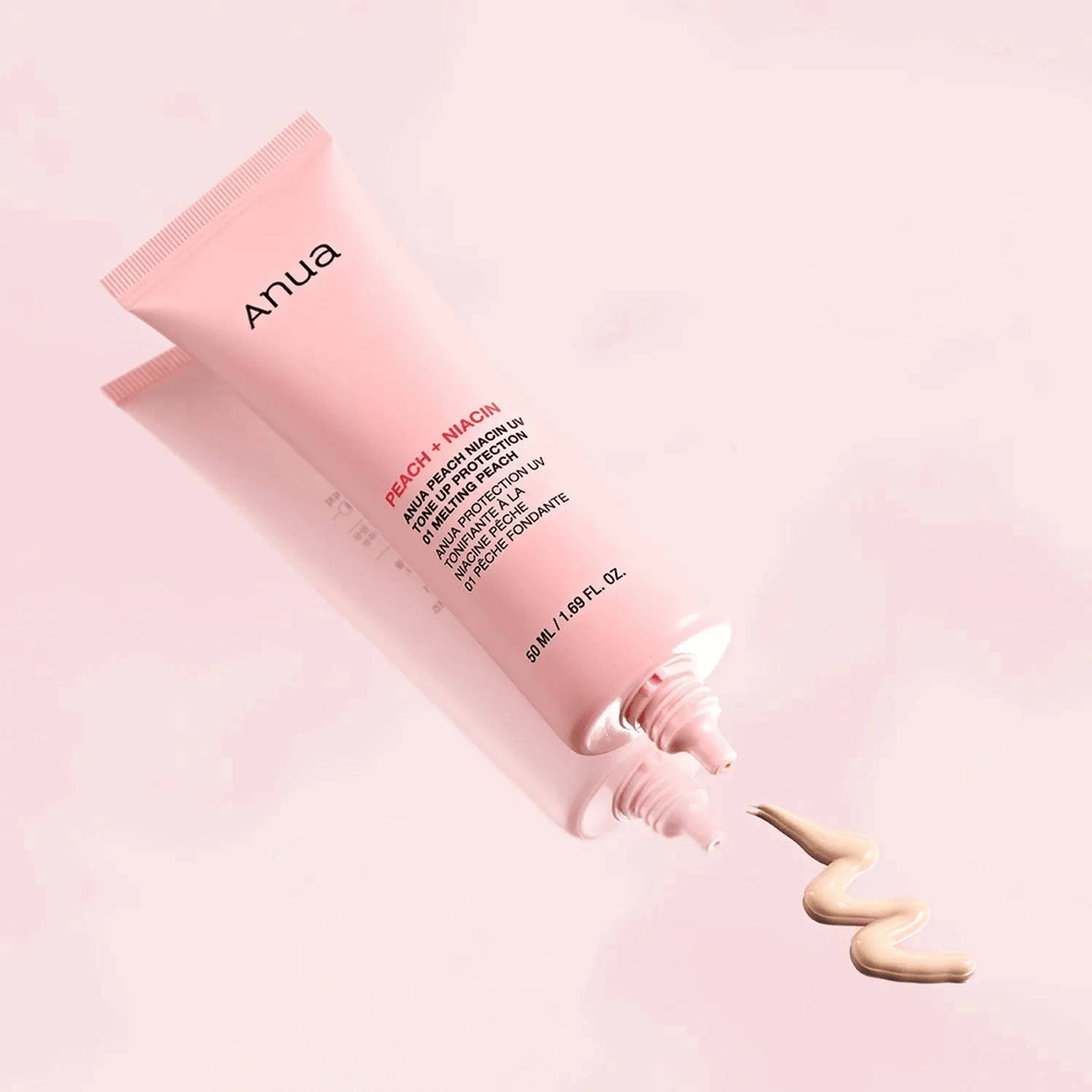 Anua Peach Niacin UV Tone Up Protection 01 Melting Peach 50ml tubes with cream swatch