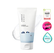Front view of 1025 Dokdo Cleanser showcasing white tube packaging with foam and three award badges