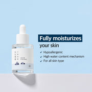 Front view of 1025 Dokdo Ampoule with fully moisturizes your skin headline on blue background