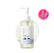 Front view of 1025 Dokdo Cleansing Oil showcasing its pump dispenser and award badge on a white background