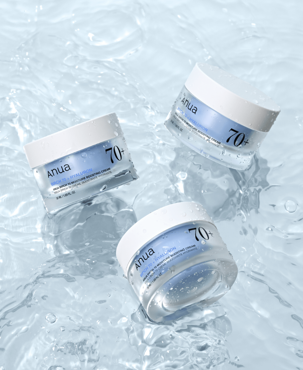 Official Anua Birch 70 Moisture Boosting Cream styling photograph showing multiple jars; purchase includes one 50 ml jar