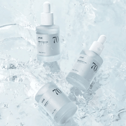Anua Birch 70 Moisture Boosting Serum bottles in water; listing includes one 30 mL bottle