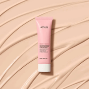 Anua Peach Niacin UV Tone Up Protection 01 Melting Peach 50ml on a cream texture background