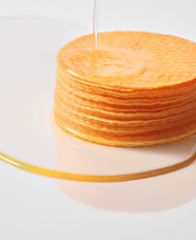 Official Anua Vitamin C Niacin pads showing embossed surface and essence