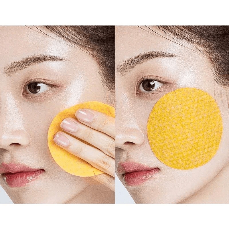 Anua Vitamin C Niacin toner pad wiping and cheek-mask application