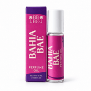 Beachy Bubbles Bath Co Bahia Bae Perfume Oil 10 mL roller with white cap and matching magenta and purple carton on white.