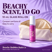 Portable 10 mL Bahia Bae glass perfume oil roller beside an ivory cosmetic pouch; pouch not included.