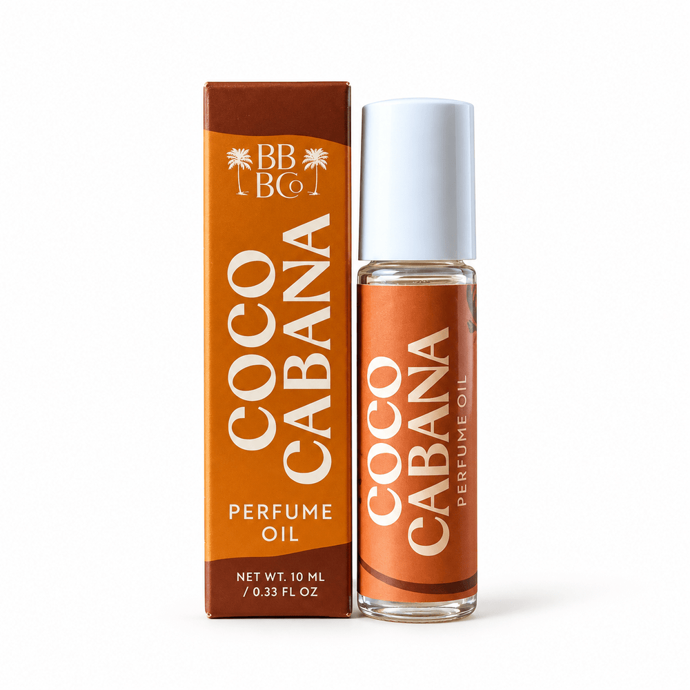 Beachy Bubbles Bath Co Coco Cabana Perfume Oil 10 mL bottle and matching orange-and-brown box on white.