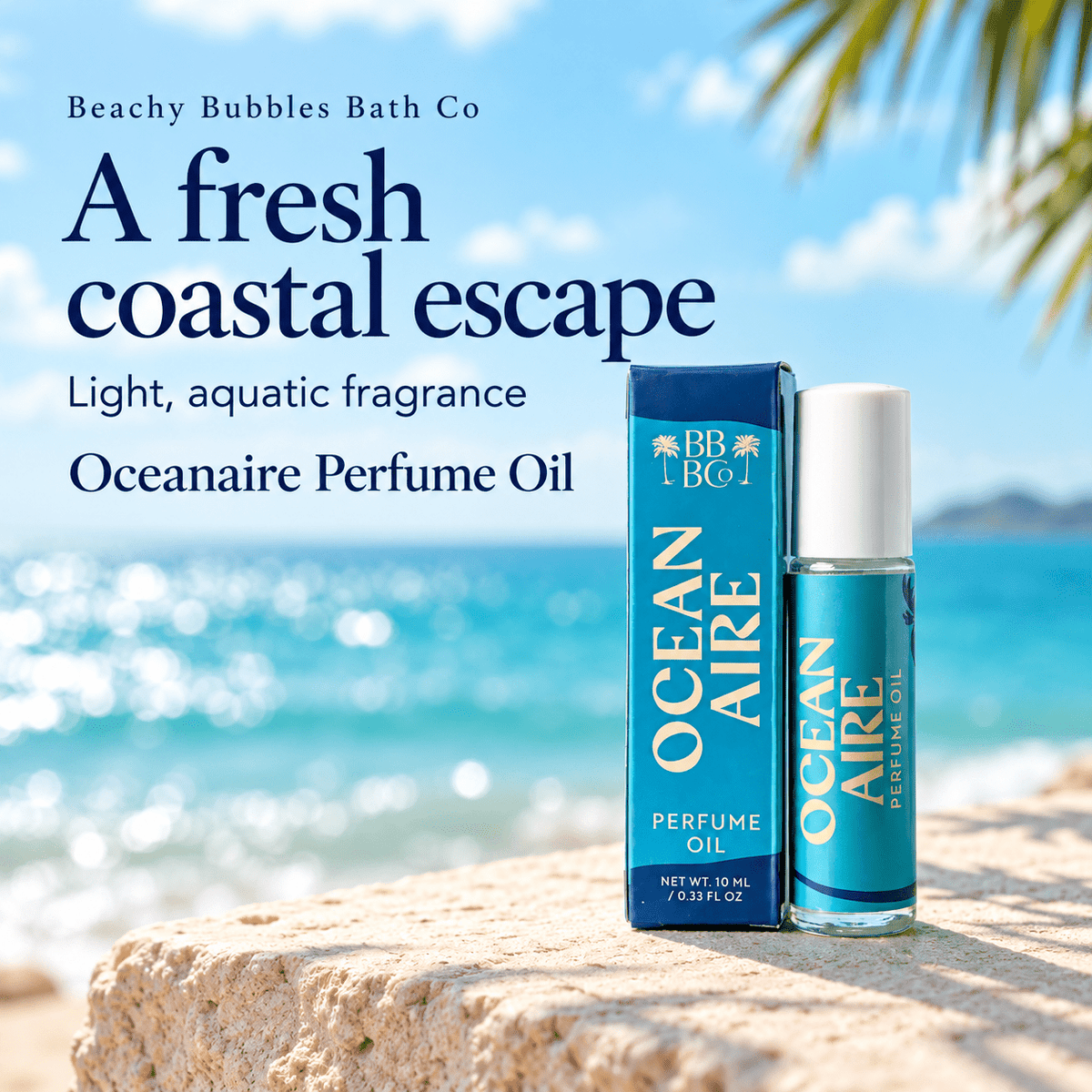 Beachy Bubbles Bath Co Oceanaire Perfume Oil and turquoise carton beside the ocean, highlighting its light aquatic fragrance.