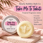 Take Me To Tahiti Body Balm fragrance notes: coconut, bergamot, kiwi blossom, vanilla and white musk, beside the pink-labeled tin and ivory balm.